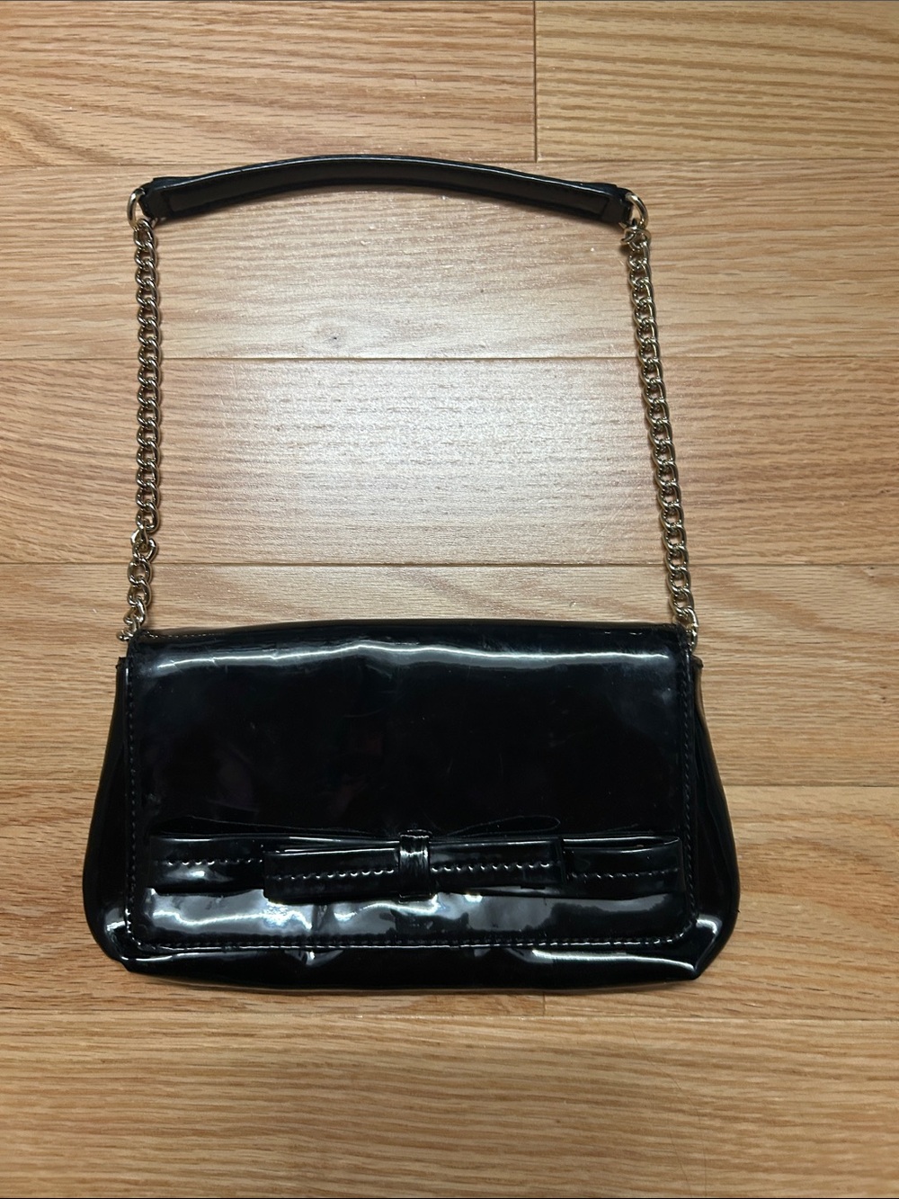 Kate Spade Elegant Black Patent Bow-Trim Clutch with Gold Chain